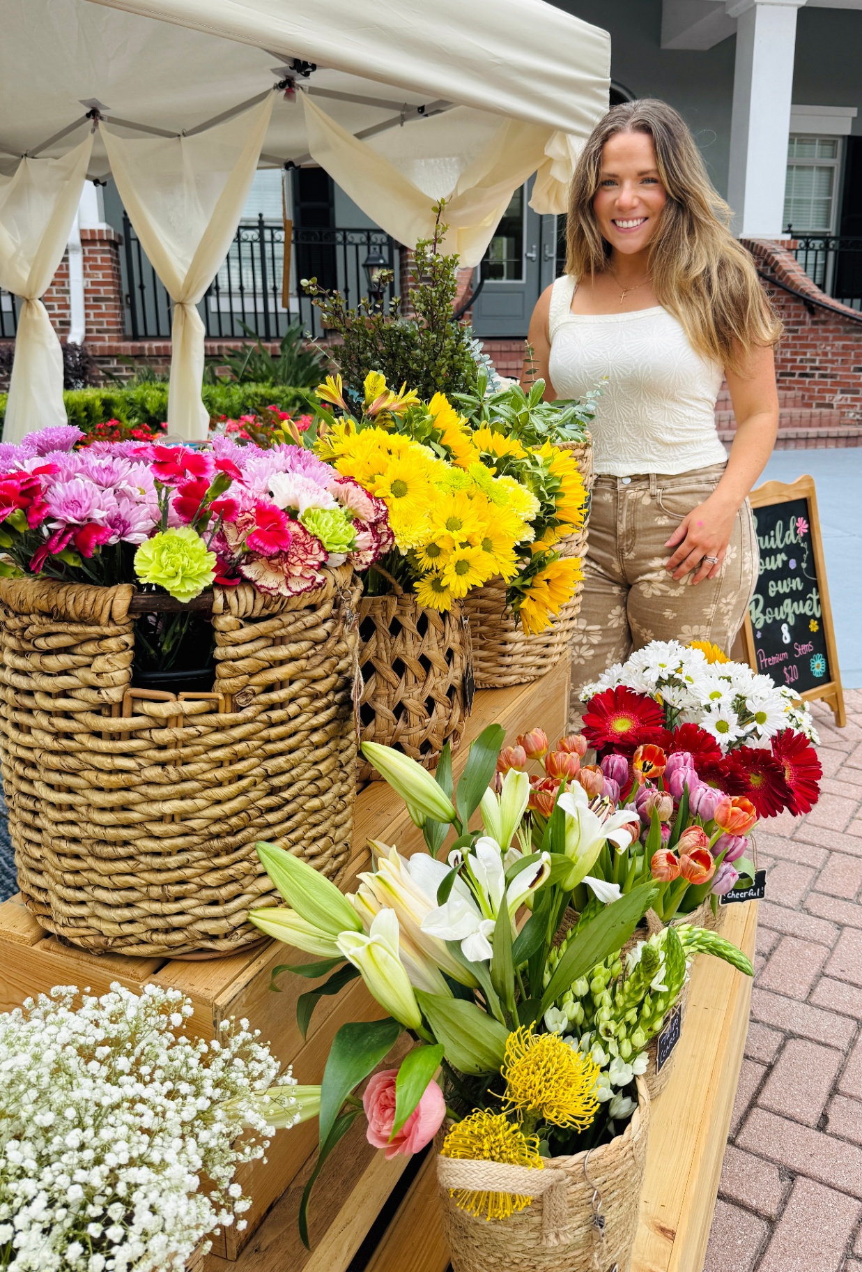 Finnie holding a colorful market bouquet